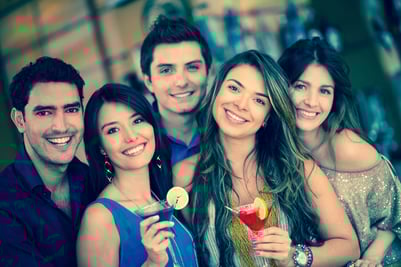 Group of friends going out to a bar and having drinks